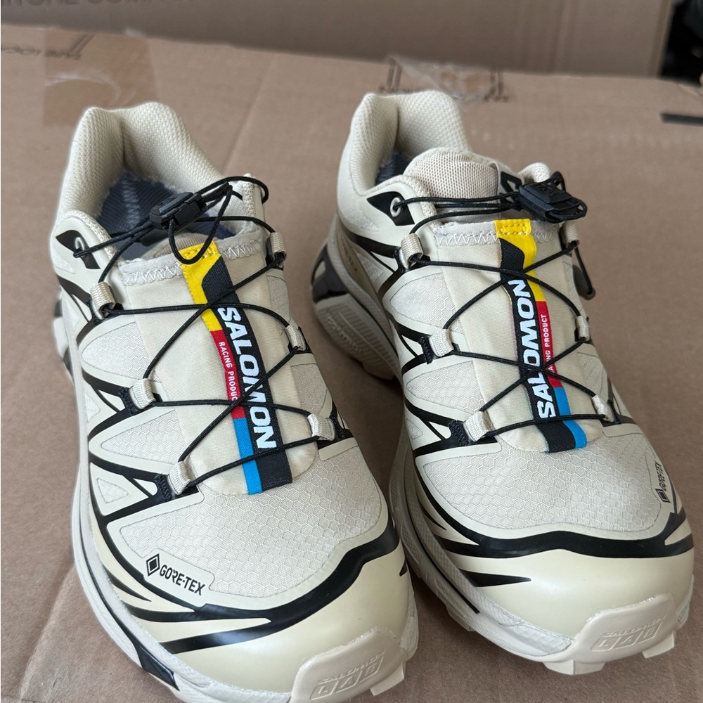 Salomon Men's Beige White Black Athletic Shoes with Yellow & Blue Accents
